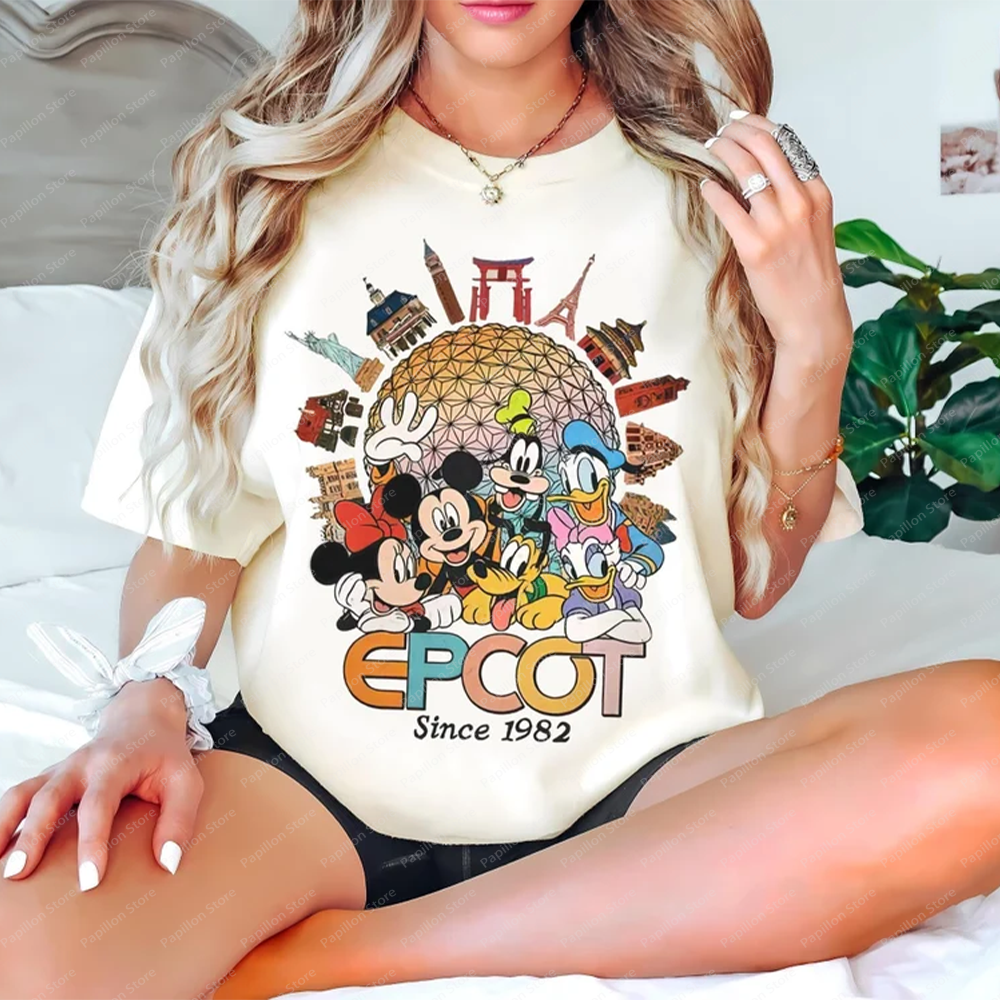 Disney Epcot World Top Friends 1982 Mickey Mouse Minnie ของขวัญ T เสื้อ Disneyland Family Trip Disney Matching Tee ผ้าฝ้ายเสื้อผ้า ราคา 152 บาท*ส่งฟรี