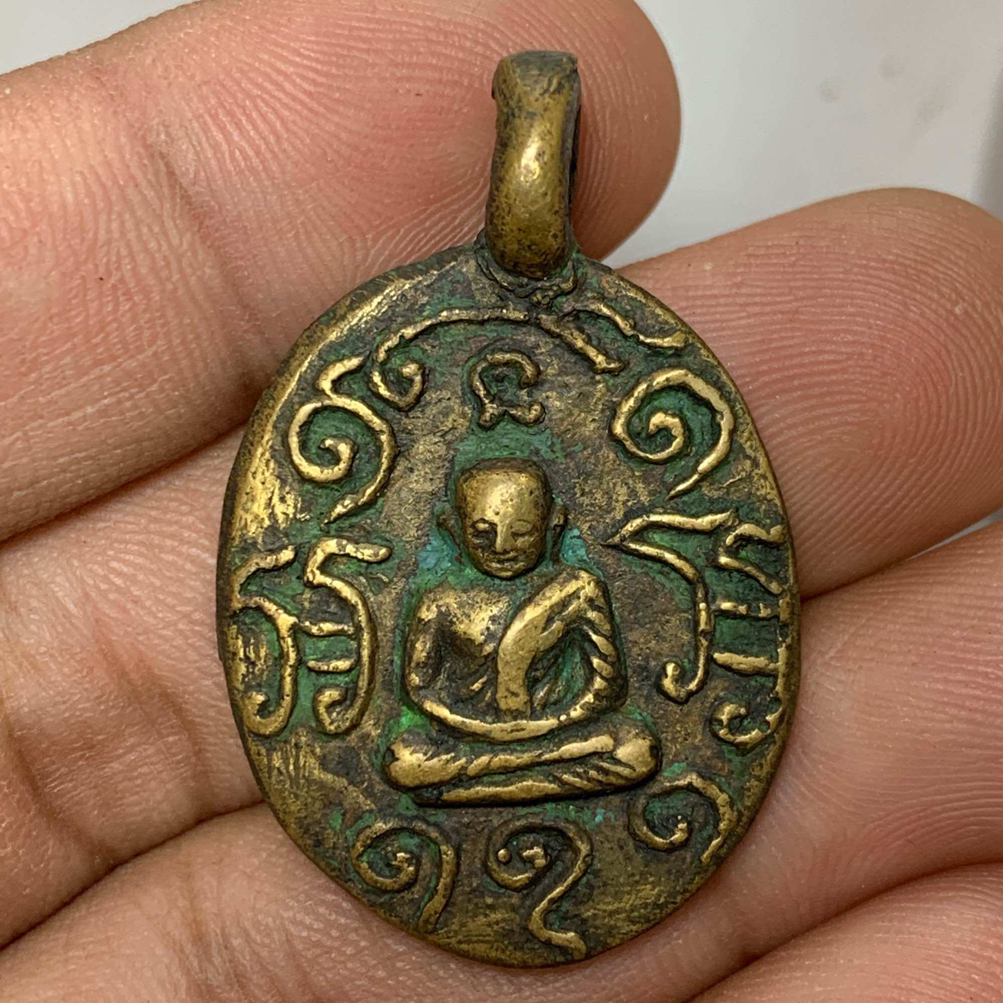 A Very Rare Coin Cast with the Image of the Silver Monk at Tha Ma Phai Temple.