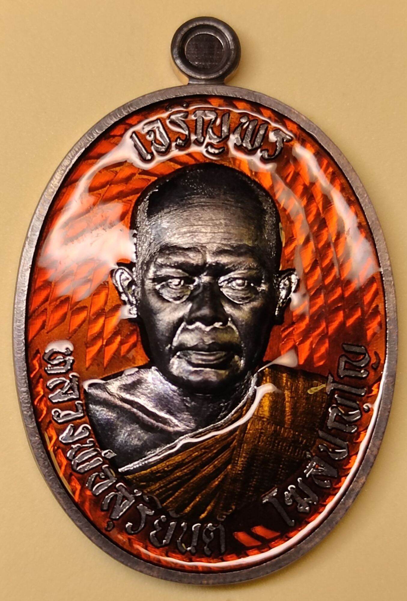 เจริญพร หลวงพ่อสุริยันต์โฆสปัญโญ รายการที่ 15 เนื้อทองแดงรมดำ ลงยาพื้นส้มลงยาจีวร พิมพ์หลังยันต์สมปรารถนา เลข7 จัดสร้าง 199 เหรียญ ราคา 3,599 บาท*ส่งฟรี