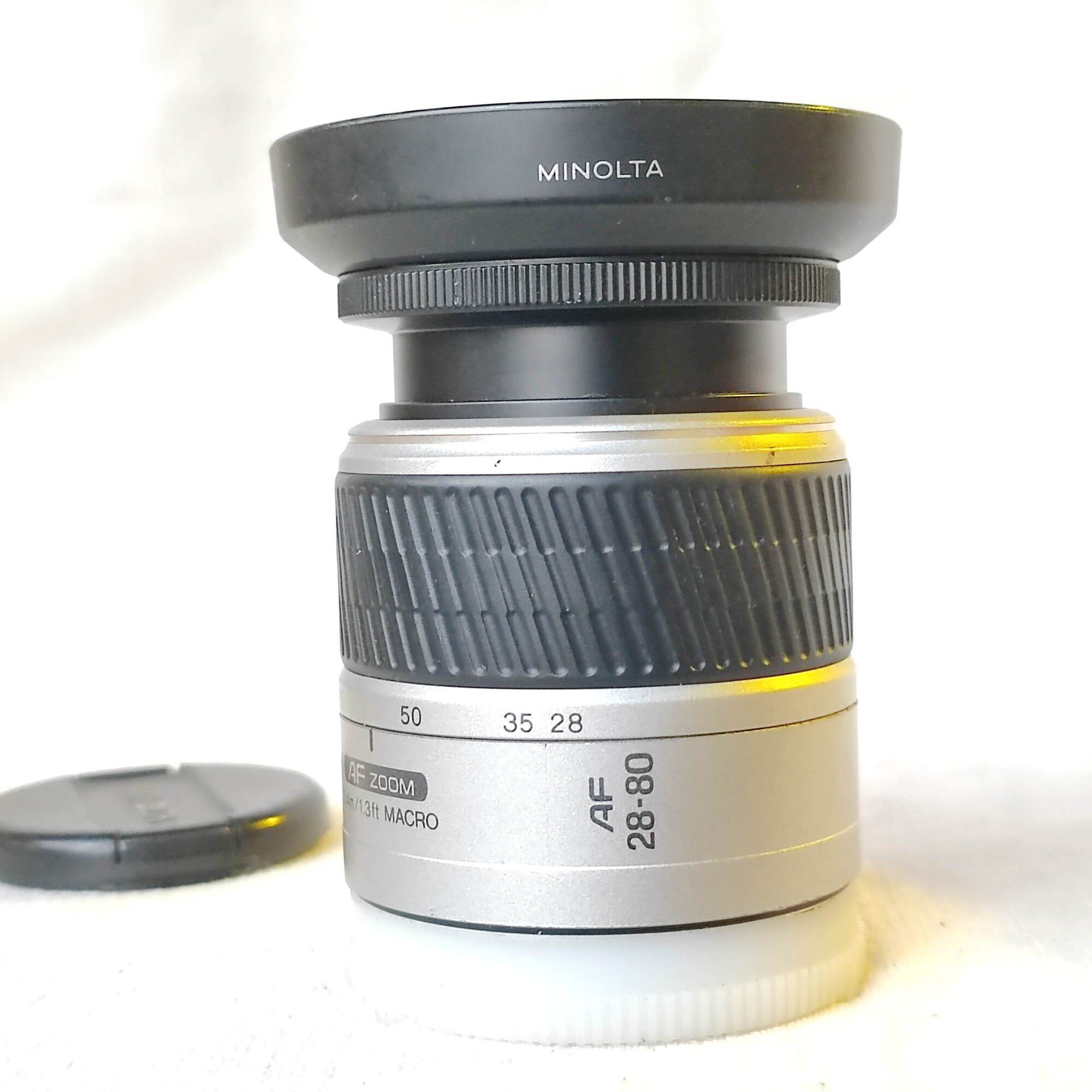 เลนส์ออโต้ Minolta af zoom 28-80mm f3.5(22)-5.6 D Macro เมาท์ A. พร้อมฝาปิดหน้า ท้าย ราคา 588 บาท*ส่งฟรี