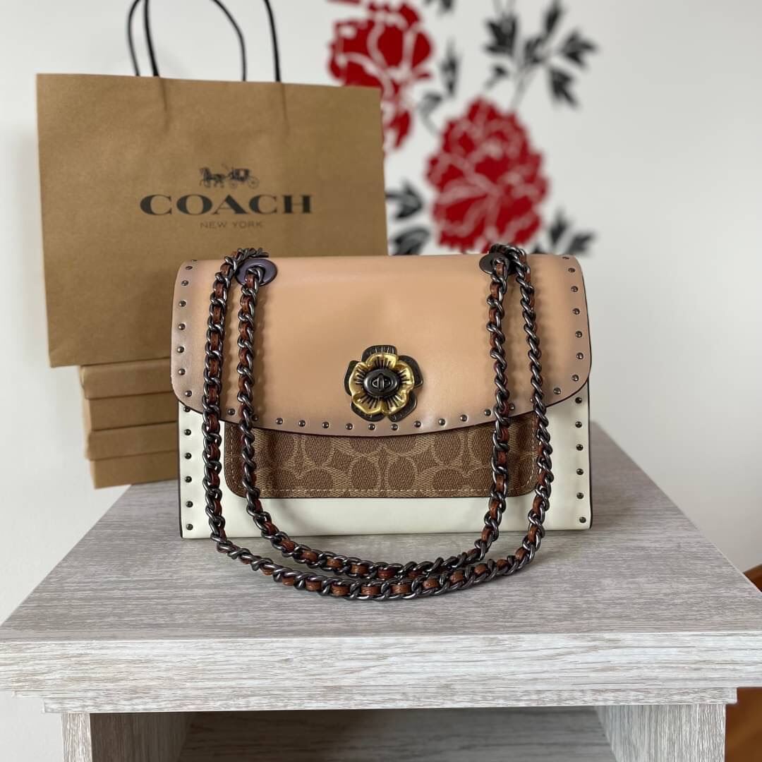 Coach parker with rivets and snakeskin hot sale