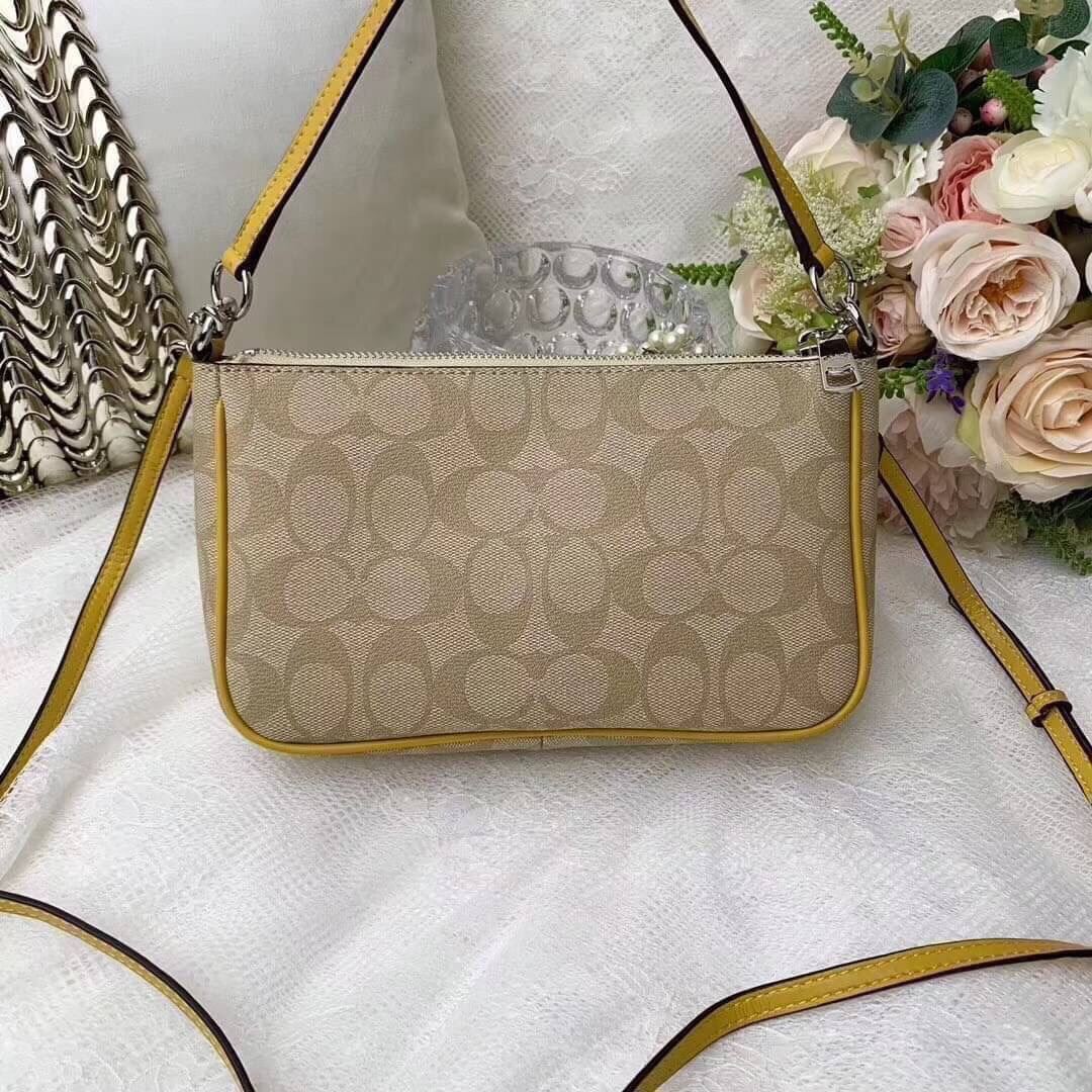 Coach Messico Top Handle Pouch In Signature Coated Canvas Puket Stores