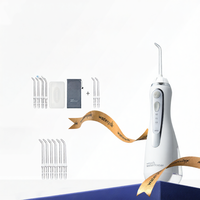 Waterpik | เครื่องพ่นน้ำล้างฟันแบบพกพา ใช้ได้กับเหล็กดัด