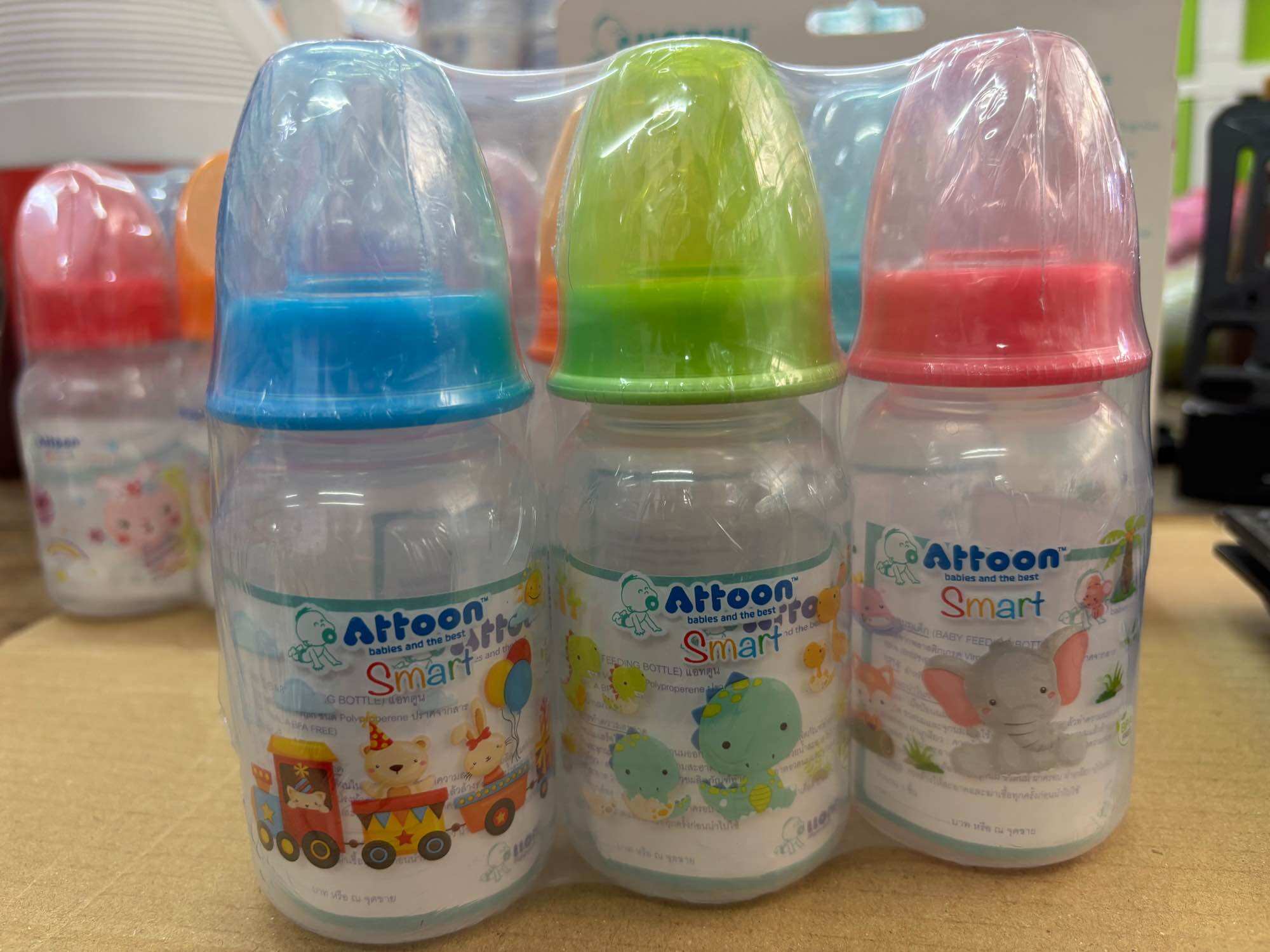 Attsoon Smart Baby Bottles, Blue, Green, Pink, Contains 6 Bottles, 4 Ounces, Bpa-Free, Easy-Open Lids. ราคา 140 บาท*ส่งฟรี