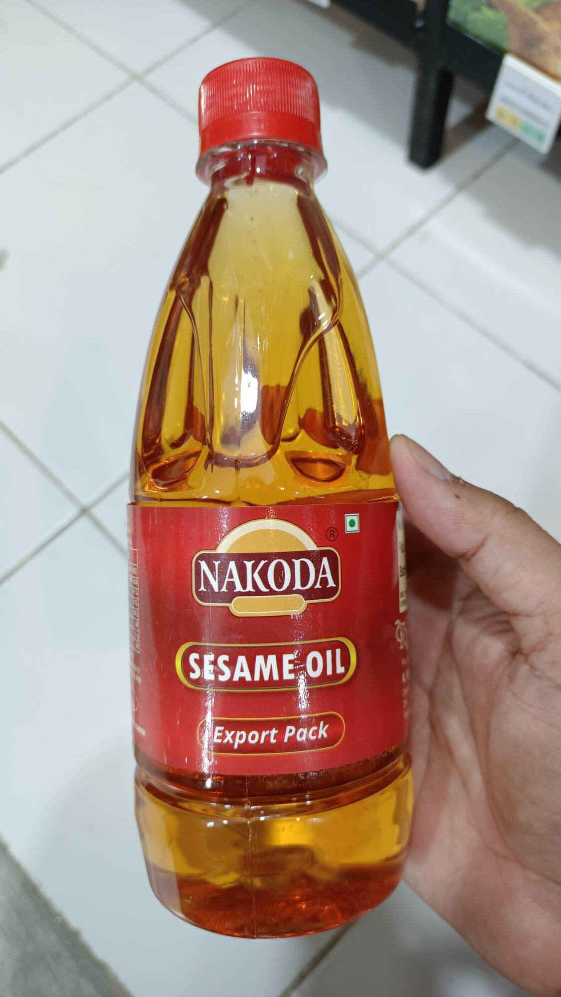 NAKODA Sesame Oil 500 ml. เซซามิ ออยล์ (น้ำมันงาธรรมชาติ)(ตรา นาโกด้า)