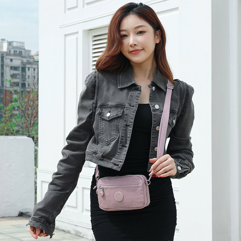 กระเป๋าสะพายข้างผ้าไนลอนแบบลำลองสำหรับผู้หญิง กระเป๋าใส่โทรศัพท์มือถือแบบสะพายข้าง 2 ซิป กระเป๋าสะพายไหล่แบบอเนกประสงค์ ราคา  441 บาท*ส่งฟรี