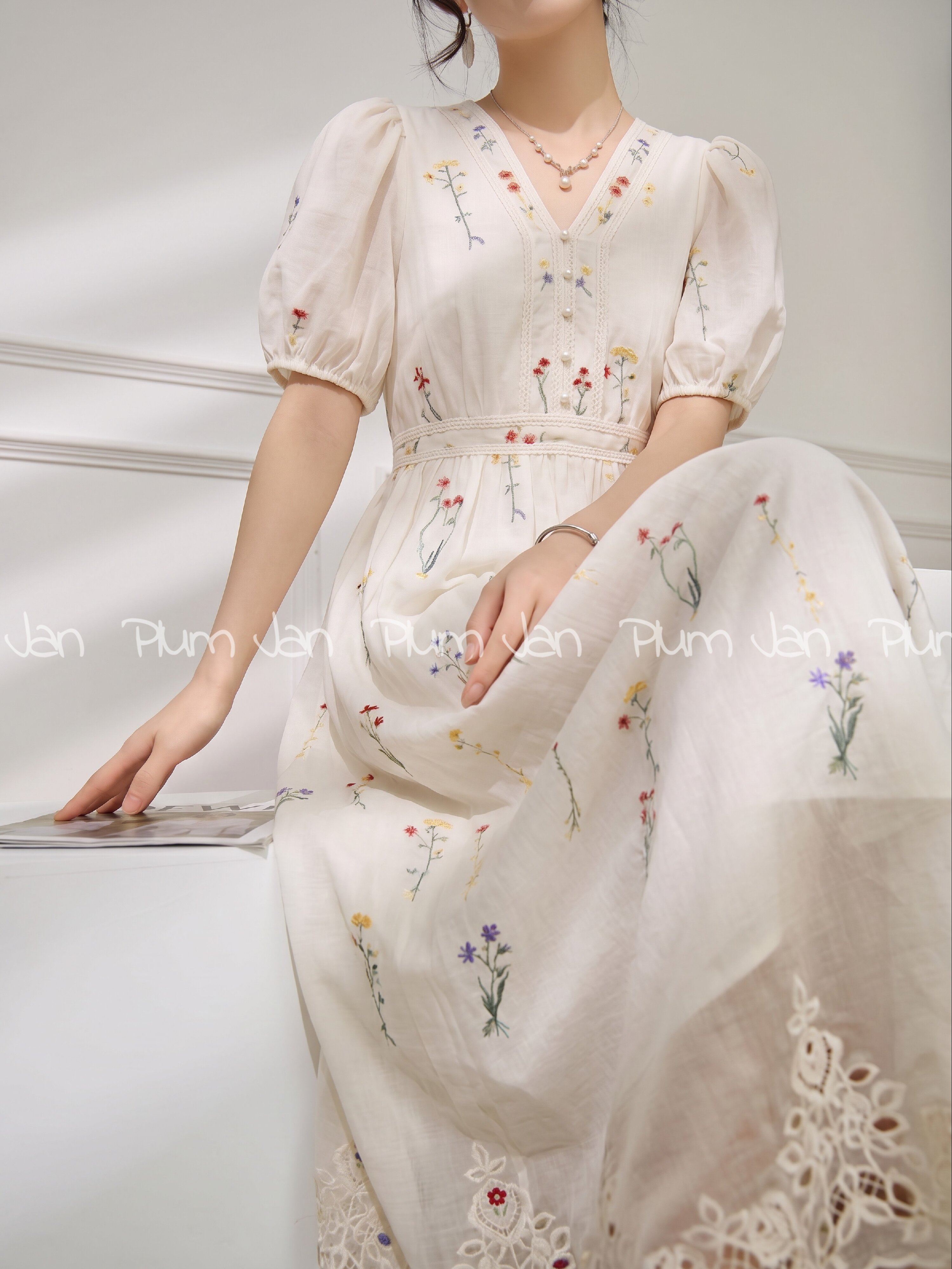 PlumJan | Floral Embroidered Peasant Sleeve Lace-Up Maxi Dress ราคา 6,397,877 บาท*ส่งฟรี