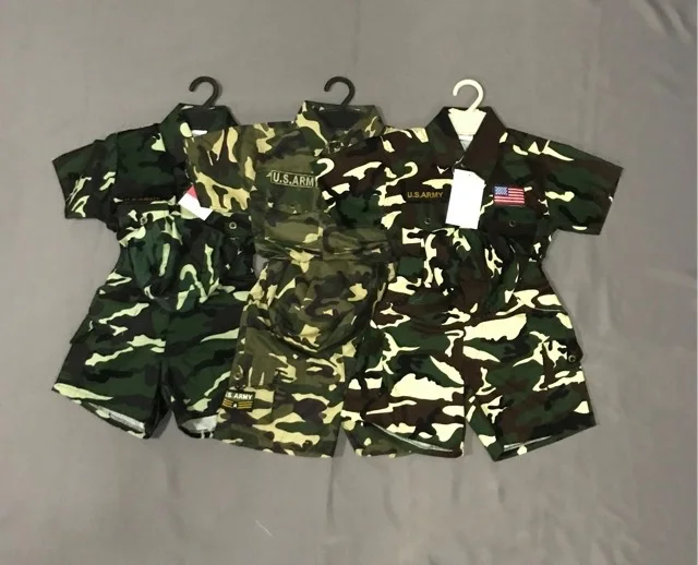 ภาพหน้าปกสินค้าชุดทหารขาสั้นเด็กลายพราง(เสื้อ+กางเกง+หมวก) ชุดทหารเด็ก