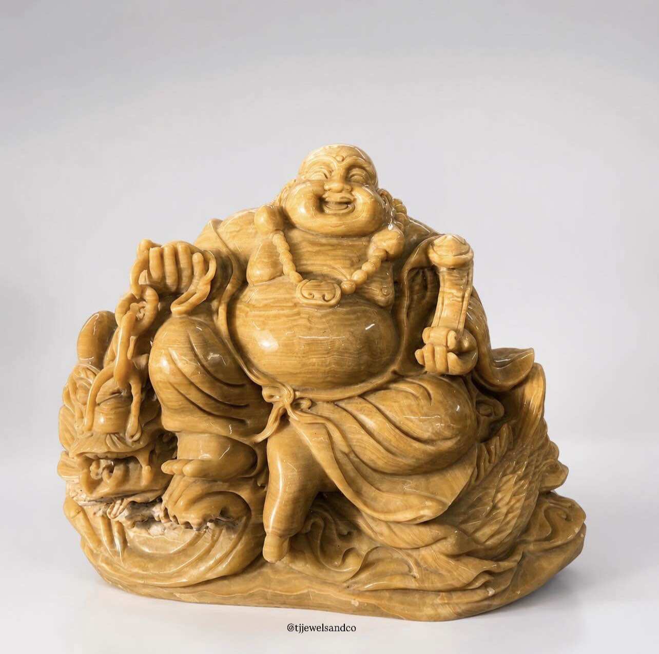 Budai with Ruyi Scepter on Dragon |   Carved Statue of the Buddha in the Shape of a Dragon Scepter, Width 18 Inches, Height 13 Inches.