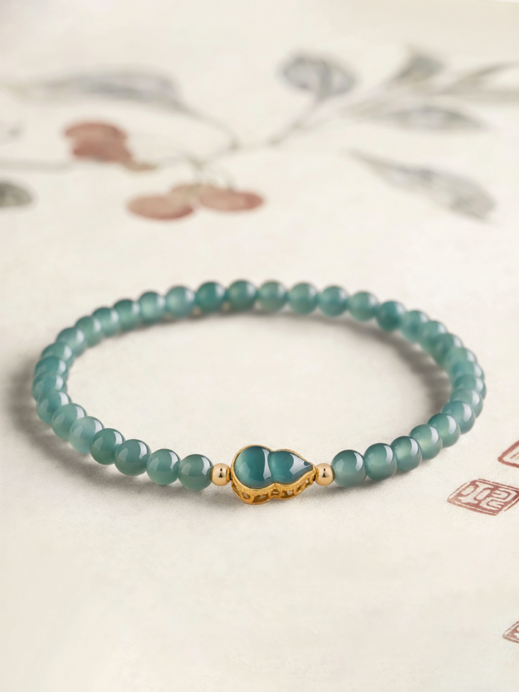 QINGXIANGTAI | Blue Water Natural Jade Gourd Fortune Turning Beads Ice Type Gold Ball Bracelet ราคา 6,260 บาท*ส่งฟรี