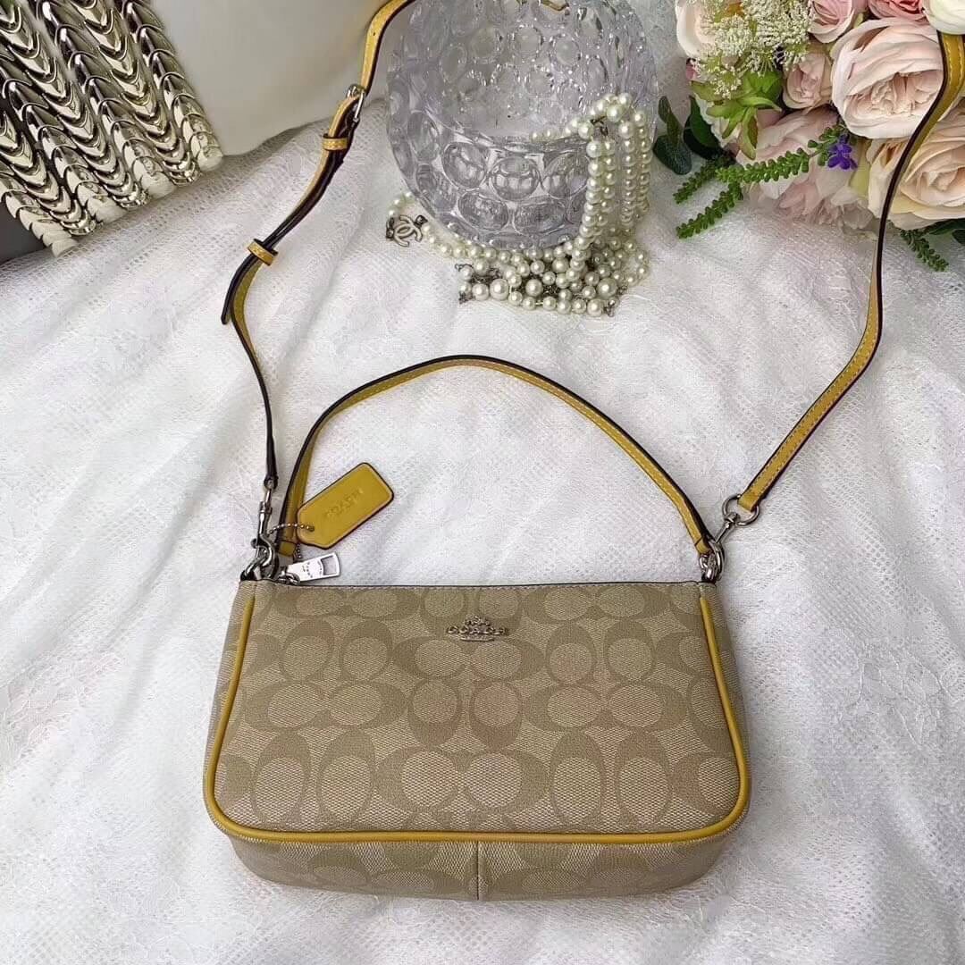 Coach Messico Top Handle Pouch In Signature Coated Canvas Puket Stores