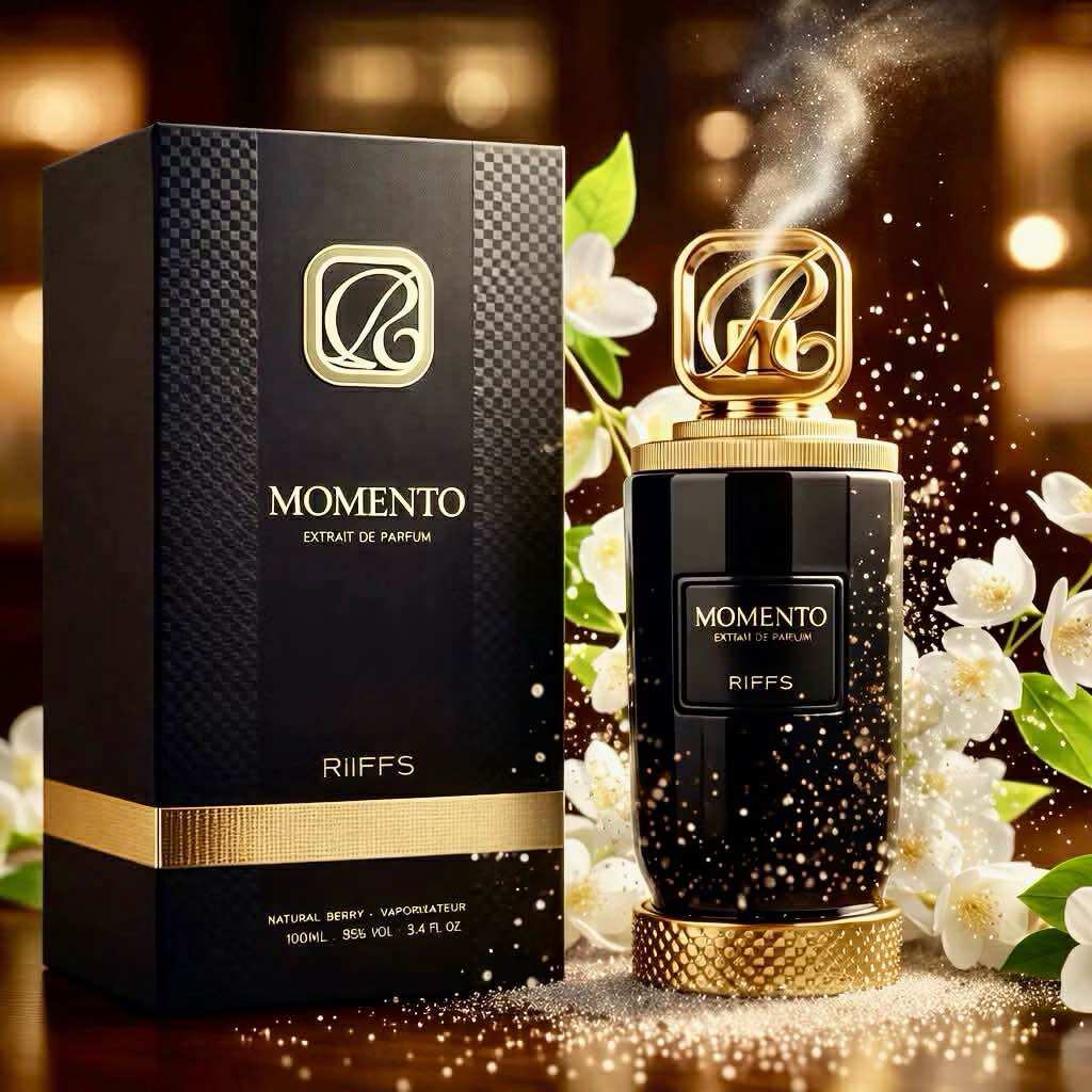 Momento Brand, Momento Riffs Perfume, Black Bottle with Gold Cap. Natural Fragrance, Size 50 Ml. Place It on the Table with White Flowers. ราคา 1,299 บาท*ส่งฟรี